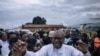 (FILES) Congolese doctor and presidential candidate Denis Mukwege greets supporters outside Kavumu-Bukavu airport as he arrives to hold a campaign rally in Bukavu, capital of South Kivu province, eastern Democratic Republic of Congo, on November 25, 2023.