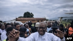 FILE - Congolese doctor and presidential candidate Denis Mukwege greets supporters outside Kavumu-Bukavu airport as he arrives to hold a campaign rally in Bukavu, capital of South Kivu province, eastern Democratic Republic of Congo, on November 25, 2023.