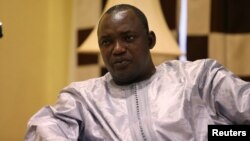 FILE - Gambian President-elect Adama Barrow is shown during an interview in Banjul, Gambia, Dec. 12, 2016. Barrow flew to Senegal, a day after West African leaders failed to persuade President Yahya Jammeh to step aside.