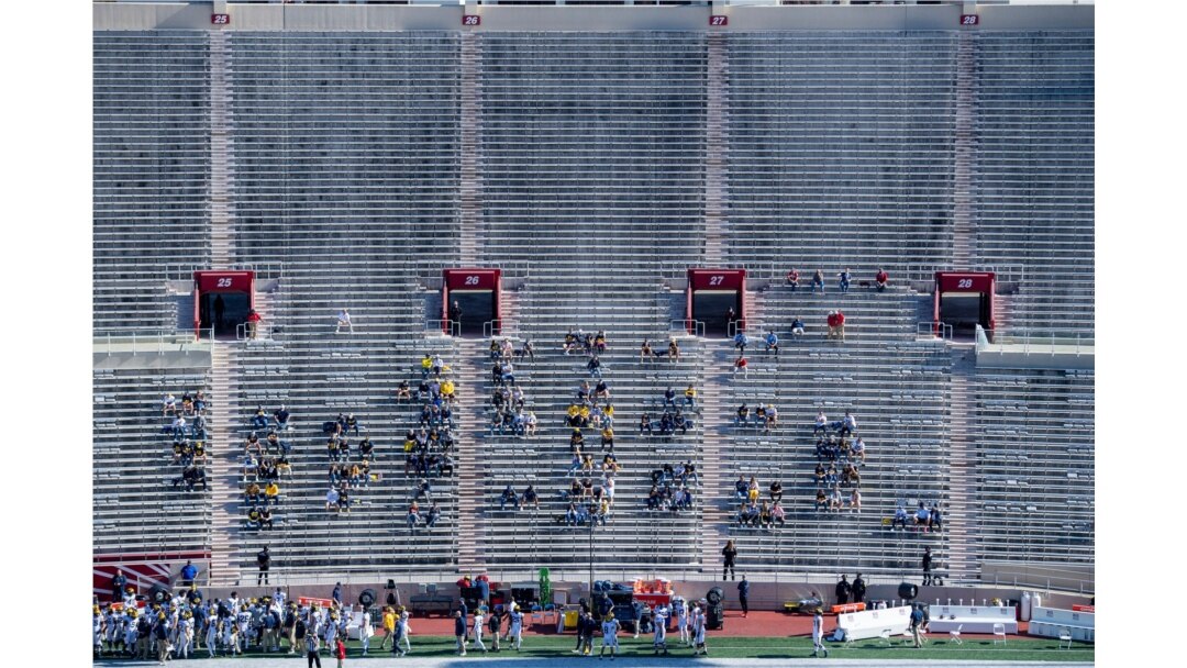 Michigan University fans watch during the first half of an NCAA college football game against Indiana at Memorial Stadium, Nov. 7, 2020, in Bloomington, Indiana.