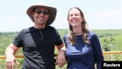 Paulo Siqueira and Juliana Armelin, finance professionals who became coffee farmers, pose for a picture at Terra Alta farm in Ibia, Minas Gerais state, Brazil, Oct. 18, 2016. (Courtesy of Terra Alta farm) 