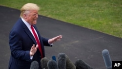 FILE - President Donald Trump speaks with reporters before departing from the South Lawn of the White House, in Washington, Sept. 9, 2019.