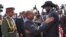 South Sudanese President Salva Kiir (r.) hugs his Sudanese counterpart Omar al Bashir as he arrives at Juba airport on Friday, April 12, 2013. The Sudanese president was visiting South Sudan for the first time since it split from Sudan in 2011.
