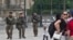French soldiers patrol by the glass pyramid at the Louvre museum in Paris, Aug. 18, 2016. French soldiers patrol by the glass pyramid at the Louvre museum in Paris, Thursday, Aug. 18, 2016. France has been under a state of emergency since attacks claimed by Islamic State in Paris in November killed 130, extended after a radical truck driver killed 85 in Nice. 