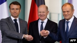 （從左至右)法國總統阿馬克、德國總理朔爾茨和波蘭總理圖斯克在波蘭舉行聯合記者會。(2024年3月15日)