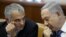 FILE - Israeli Prime Minister Benjamin Netanyahu (R) speaks with Finance Minister Moshe Kahlon during the weekly cabinet meeting in Jerusalem, Jan. 31, 2016. 