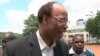 Mel Reynolds smiled as he walked past journalists and into Zimbabwe's Harare courthouse.