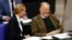 The co-leaders of the Alternative for Germany (AfD) far-right party, Alexander Gauland and Alice Weidel, laugh as they attend a session at the Bundestag lower house of Parliament in Berlin, Nov. 21, 2017. 