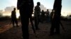 FILE - Security forces gather near the border between Kenya and Somalia, Oct. 15, 2011. The Somalia National Army reportedly was deployed to the border on Dec. 16, 2020, following Somalia's announcement that it is severing diplomatic ties with Kenya. 