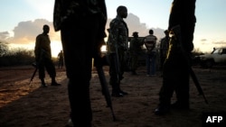 FILE - Security forces gather near the border between Kenya and Somalia, Oct. 15, 2011. The Somalia National Army reportedly was deployed to the border on Dec. 16, 2020, following Somalia's announcement that it is severing diplomatic ties with Kenya. 