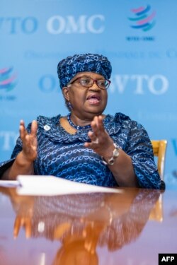 FILE - Director-General of the World Trade Organization (WTO) Ngozi Okonjo-Iweala gestures as she addresses media during a press conference at the World Trade Organization (WTO) headquarters in Geneva on February 16, 2024.