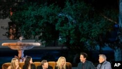 This image provided by HBO Max shows, from left, Jennifer Aniston, Courteney Cox, Matthew Perry, Lisa Kudrow, David Schwimmer and Matt LeBlanc in a scene from the "Friends" reunion special. (Terence Patrick/HBO Max via AP)