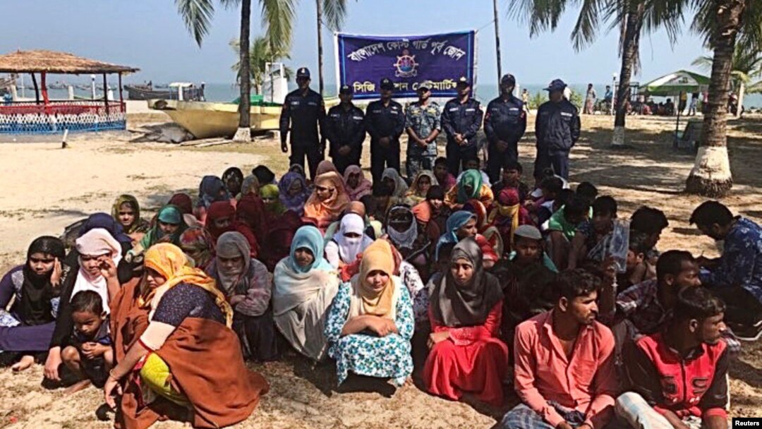 ohingya refugees wait after their boat capsized near the Saint Martin's island in the Bay of Bengal, in Teknaf, near Cox's Bazar, Bangladesh, February 11, 2020.