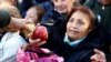 Long Lines Form for Free Fruit in Buenos Aires