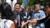 Hawaii Attorney General Douglas Chin speaks outside Federal Court house in Honolulu, March 29, 2017. Chin, the son of Chinese immigrants, argues that the Trump White House's travel ban, even its revised version, is discriminatory.