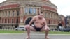 Rishiki from Japan's Sumo Kyokai, Daisuke Kitanowaka, poses for a photo outside London's Royal Albert Hall, Dec. 4, 2024.