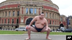 Rishiki from Japan's Sumo Kyokai, Daisuke Kitanowaka, poses for a photo outside London's Royal Albert Hall, Dec. 4, 2024.