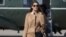 FILE - In this Sept. 12, 2020, photo, Counselor to the President Hope Hicks arrives with President Donald Trump at Reno-Tahoe International Airport in Reno, Nev.