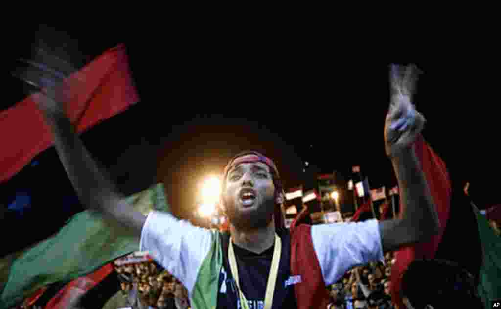 Tens of thousands of Libyans celebrate the fall of Tripoli to Libyan rebels on Aug. 21, 2011 in Benghazi, Libya. (AFP)