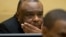 Former Congo vice-president Jean-Pierre Bemba looks up at his trial at the International Criminal Court in The Hague, Netherlands, Sept. 29, 2015.