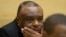 FILE - Former Congo vice-president Jean-Pierre Bemba looks up at his trial at the International Criminal Court in The Hague, Netherlands, Sept. 29, 2015.