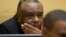 FILE - Former Congo vice-president Jean-Pierre Bemba looks up at his trial at the International Criminal Court in The Hague, Netherlands, Sept. 29, 2015.