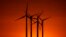 FILE - Wind turbines are silhouetted against the setting sun at the Spearville Wind Farm, Sept. 29, 2024, near Spearville, Kansas.