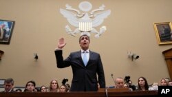 Michael Cohen, President Donald Trump's former personal lawyer, is sworn in to testify before the House Oversight and Reform Committee on Capitol Hill in Washington, Feb. 27, 2019.