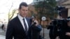 Ben Roberts-Smith (kiri), tiba di Pengadilan Federal di Sydney, Rabu, 9 Juni 2021. (AP/Rick Rycroft)