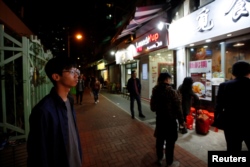 FILE - Independence activist Tony Chung is pictured on a street in Hong Kong, China, Jan. 8, 2019.