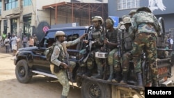 Members of the M23 rebel group gather on their truck following their takeover of Bukavu, eastern Democratic Republic of Congo, Feb. 20, 2025. 