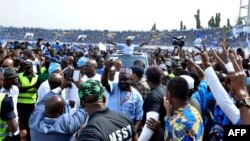 Benin businessman Sebastien Ajavon gesturing at his supporters from the roof of a car during a rally in Cotonou, Jan. 3, 2016. 