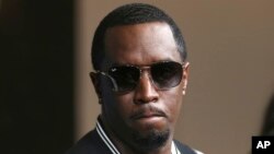 FILE - Sean Combs arrives at the LA Premiere of "The Four: Battle For Stardom" at the CBS Radford Studio Center in Los Angeles. 