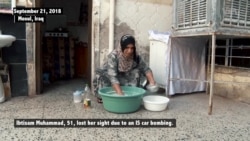 Mosul Woman Blinded by IS Bombing Makes Bread to Support Her Family