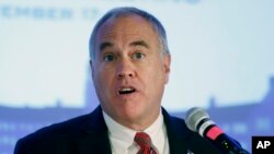 FILE - New York State Comptroller Thomas DiNapoli, pictured in September 2014, says the new $2B index will reduce or eliminate investments in companies that are large contributors to carbon emissions.