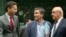 FILE - Greek Finance Minister Euclid Tsakalotos, center, speaks with Dutch Finance Minister Jeroen Dijsselbloem, left, and French Finance Minister Michel Sapin during a meeting of eurozone finance ministers in Brussels, July 7, 2015. 