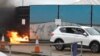 Seorang pria melempar bom molotov dari dalam mobil ke tempat penampungan migran di Dover, Inggris, pada 30 Oktober 2022. (Foto: Reuters/Peter Nicholls)