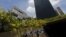 The headquarters of oil company Petrobras (L) is pictured next to the headquarters of Brazilian Development Bank (BNDES) in Rio de Janeiro, March 20, 2015. 