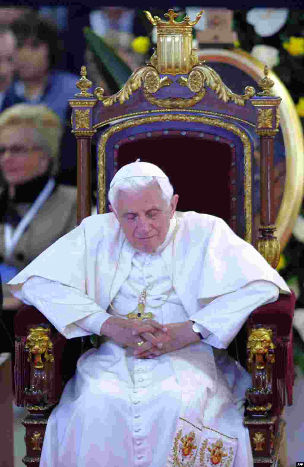 Pope Benedict XVI pauses at the Nen Deu institute in Barcelona, Spain, Sunday, Nov. 7, 2010. The Pope consecrated La Sagrada Familia, the Barcelona landmark designed by Antoni Gaudi, whose construction began in 1882 and continues today. (AP Photo/Manu Fer