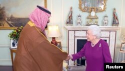 Britain's Queen Elizabeth greets Mohammed bin Salman, the Crown Prince of Saudi Arabia, during a private audience at Buckingham Palace in London, Britain, March 7, 2018.