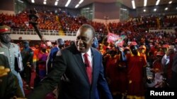 Kenya's President Uhuru Kenyatta arrives to the an event unveiling the Jubilee Party's manifesto in Nairobi, Kenya June 26, 2017. 