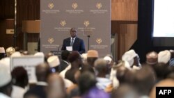 FILE — Senegal's President Macky Sall delivers a speech during the National Dialogue in Diamniadio on February 26, 2024.