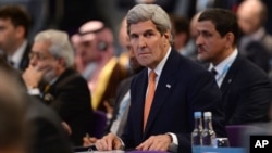 FILE - U.S. Secretary of State John Kerry attends the "Supporting Syria and the Region" conference in London, Feb. 4, 2016. Kerry plans to meet with State Department employees who submitted a cable calling for a more muscular U.S. Syria policy.