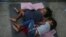 Niños migrantes duermen en el piso de un refugio en Nuevo Laredo, México, el 17 de julio de 2019.