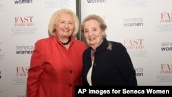 FILE - Former Secretary of State Madeleine Albright, right, poses with Ambassador Melanne Verveer, co-founder Seneca Women, at Seneca Women's Fast Forward Women’s Innovation Forum, Sept. 29, 2018, at the Metropolitan Museum of Art in New York. 