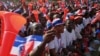 Supporters of opposition presidential candidate Nana Akufo-Addo cheer during his final campaign rally ahead of Friday's presidential election, in Accra, December 5, 2012. 