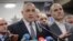 FILE - Bulgarian ex-Premier Boiko Borisov, leader of the center-right GERB party, gestures during a statement at the party's headquarters, in Sofia, Bulgaria, March 26, 2017. 