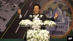 FILE - Pakistani Prime Minister Imran Khan speaks during a ceremony in Kartarpur, Pakistan, Nov. 28, 2018.