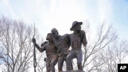 FILE —The Mississippi African-American Monument, a 9-foot tall, bronze sculpture that rests on a pedestal of African black granite, and features two Black Union soldiers, and a common field hand, on Feburary 14, 2024, in the Vicksburg National Military Park, in Vicksburg, Miss.