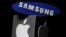 In a verdict reached May, 24, 2018, a jury said Samsung must pay Apple $539 million in damages for illegally copying some of the features of the iPhone. The Samsung and Apple logos are seen in this illustration in Zenica, Bosnia and Herzegovina, Jan. 26, 2016.